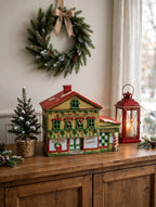 Sweet Shoppe and Bakery on an entryway console with a wreath and lantern - styled display inspiration