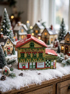 Sweet Shoppe and Bakery in a Christmas village display on a snow blanket - styled display inspiration