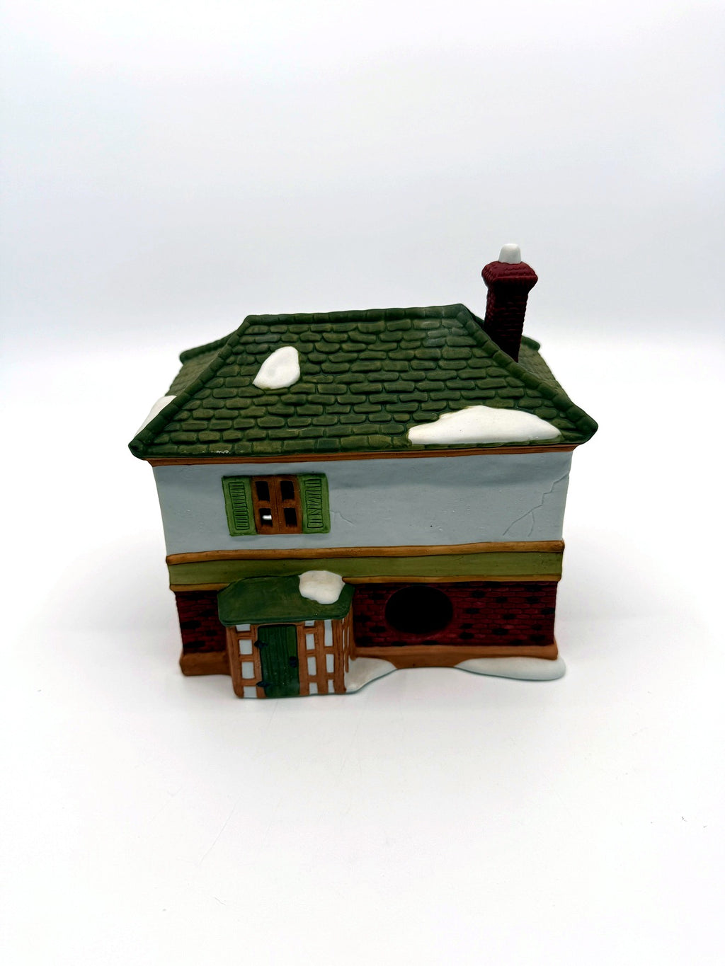 Department 56 Scrooge & Marley Counting House, Dickens' Village, 1986 – back view showing the light cord opening and side porch