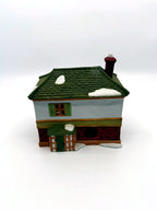 Department 56 Scrooge & Marley Counting House, Dickens' Village, 1986 – back view showing the light cord opening and side porch