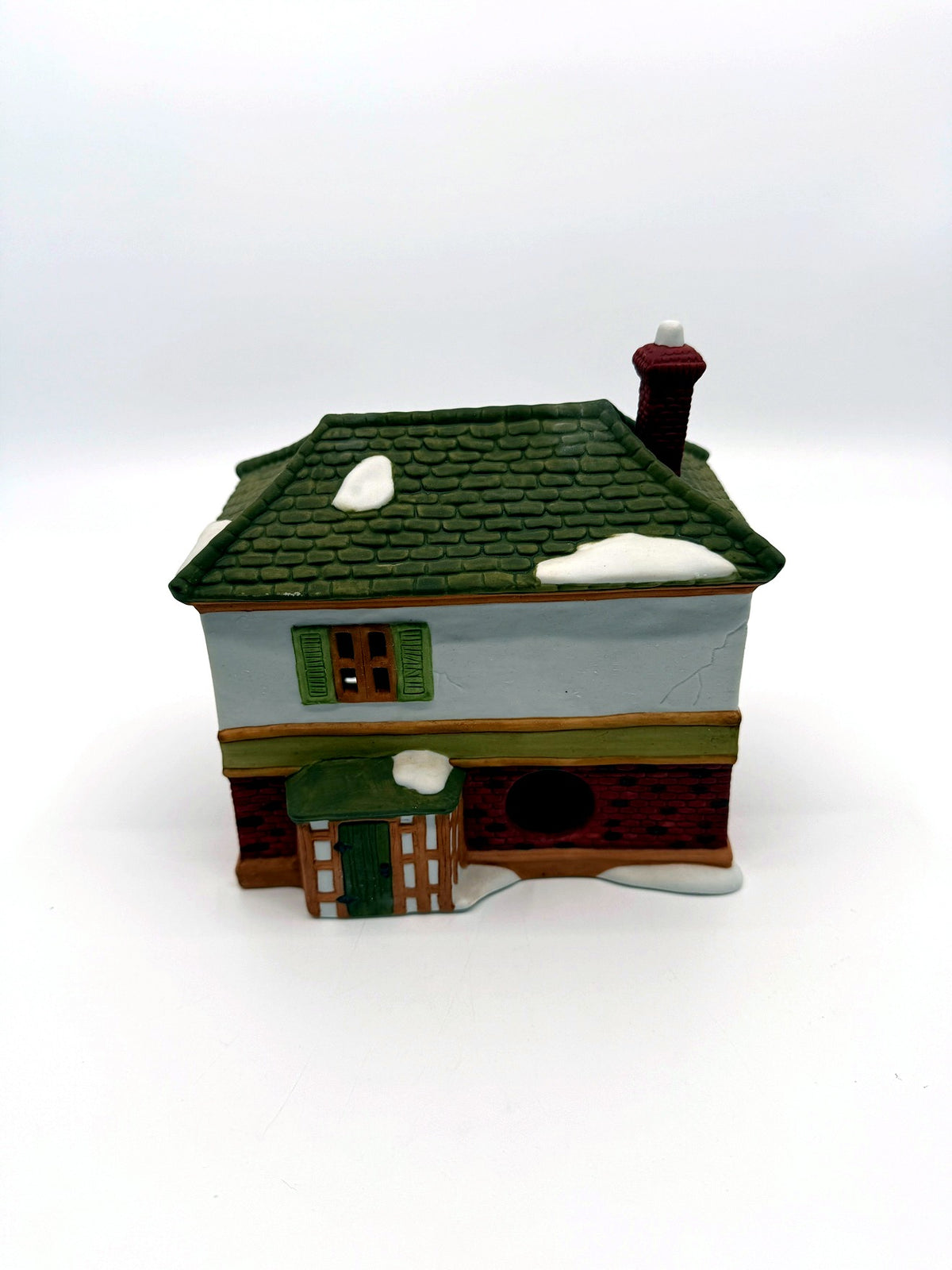 Department 56 Scrooge & Marley Counting House, Dickens' Village, 1986 – back view showing the light cord opening and side porch