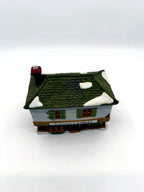 Department 56 Scrooge & Marley Counting House, Dickens' Village, 1986 – front view from above showing snow patches on the shingle roof