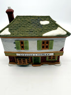 Department 56 Scrooge & Marley Counting House, Dickens' Village, 1986 – front view: Scrooge & Marley sign, bay window, green shutters