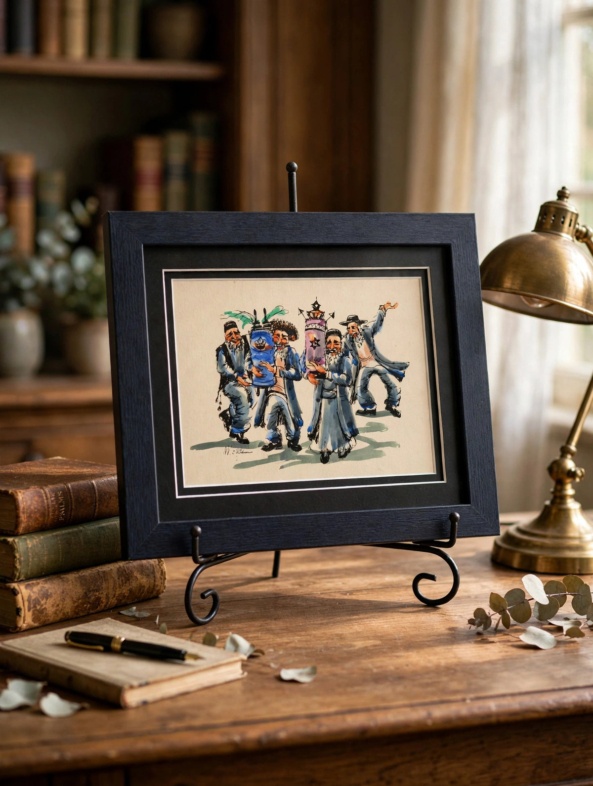 Styled lifestyle photo — the small framed watercolor standing on a wooden desk in a vintage home study (display inspiration)