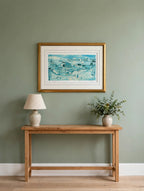 Styled lifestyle photo — the framed Shepherd's Nob lithograph hanging above a wooden console table in a bright entryway with sage green walls (display inspiration)