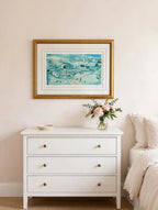 Styled lifestyle photo — the framed Shepherd's Nob lithograph hanging above a white dresser in a bright bedroom with blush and cream walls (display inspiration)