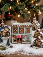 Ceramic Christmas village Toy and Doll shop in a village beneath the Christmas tree (styled display image for inspiration; the ceramic shop is the item for sale)