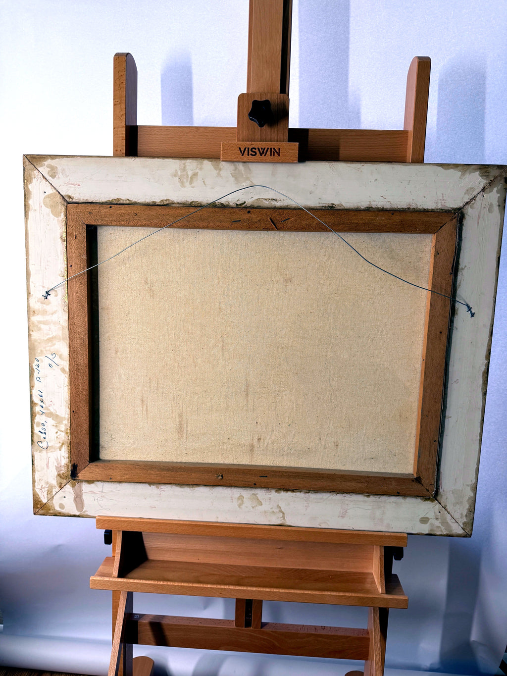 1984 signed oil on canvas tropical cottage landscape, framed — the full back of the canvas on the easel