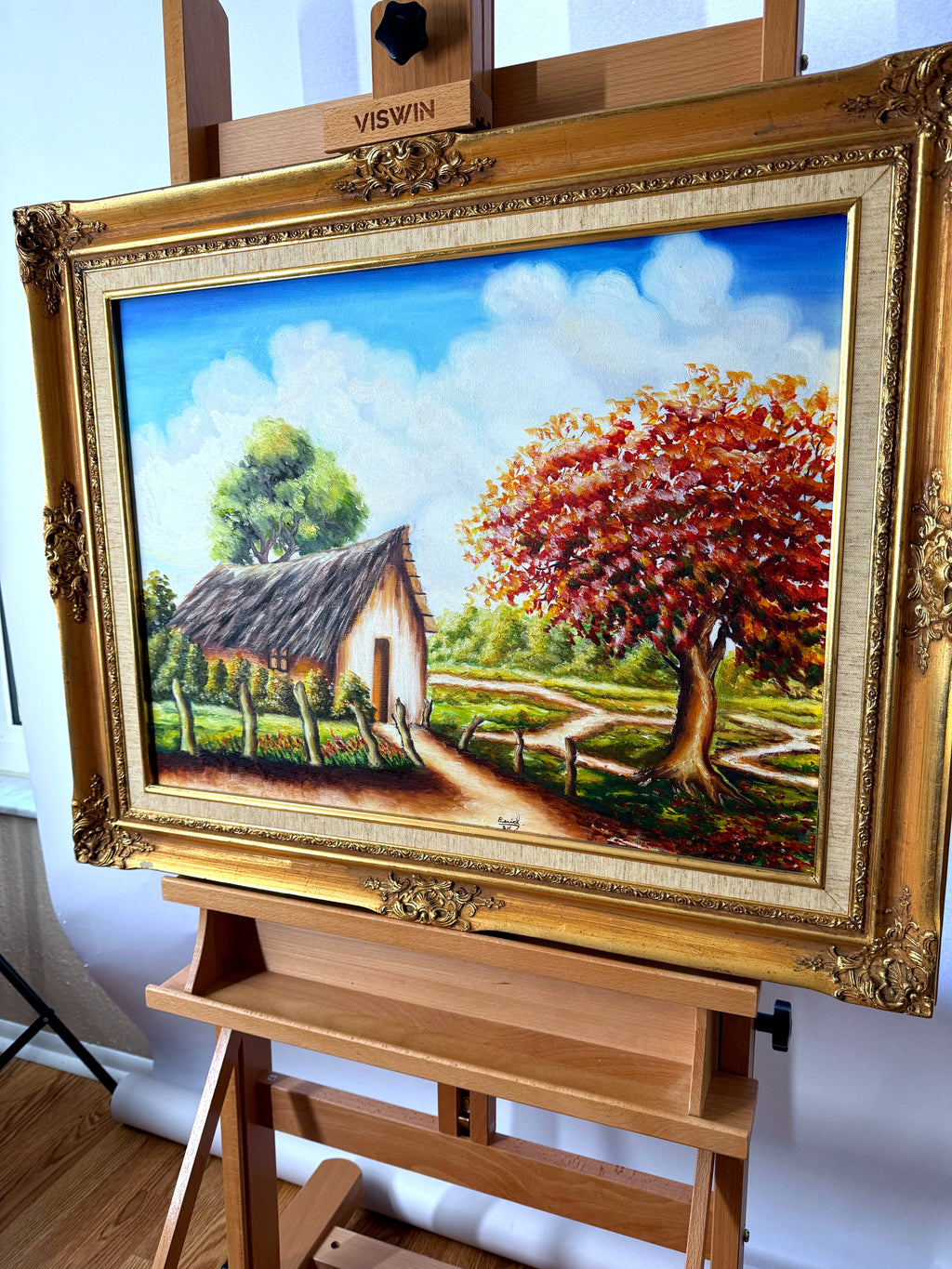 1984 signed oil on canvas tropical cottage landscape, framed — front view from a right angle