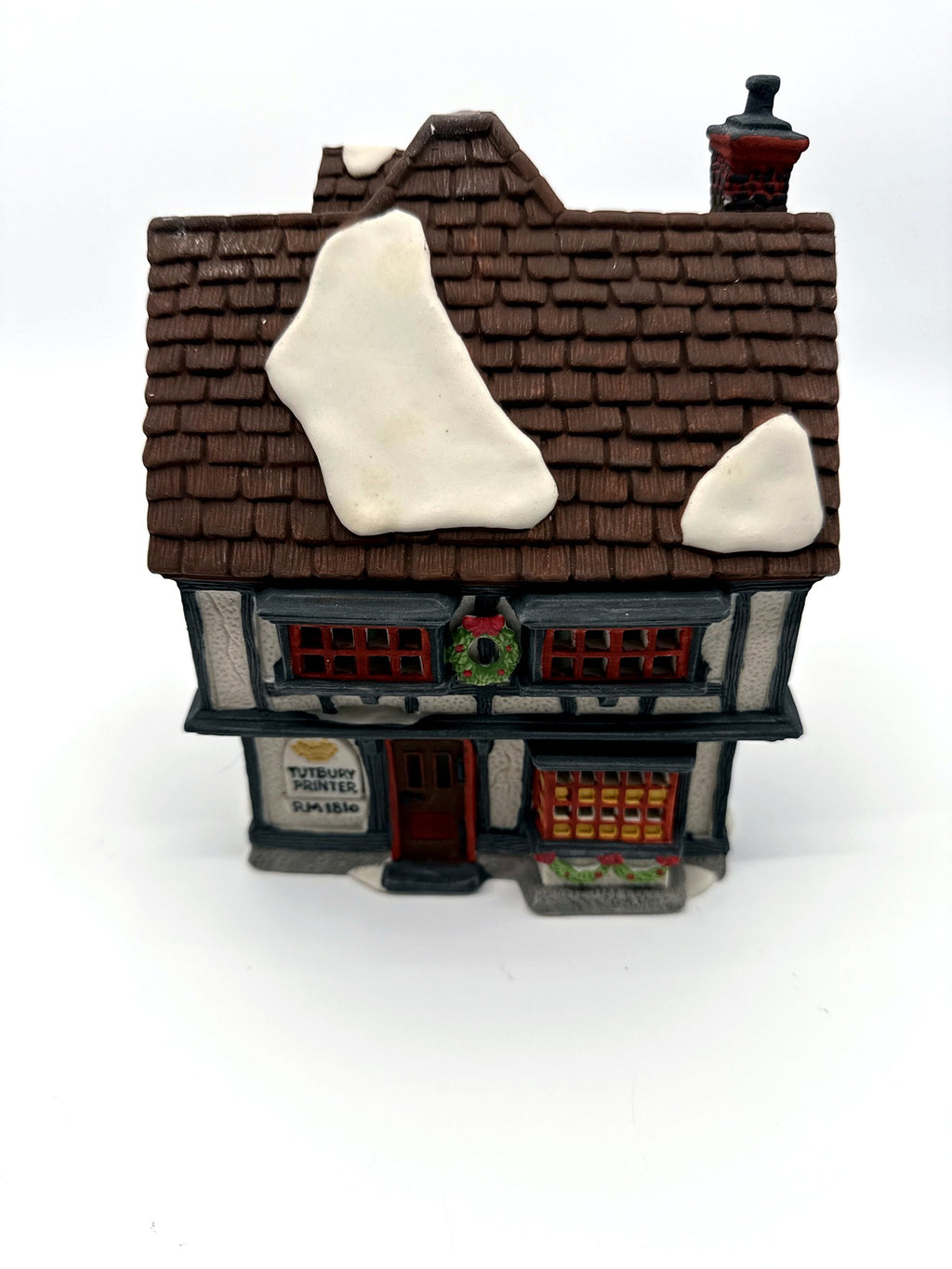 Department 56 Tutbury Printer, Dickens' Village, 1990 – front view from above showing snow patches on the shingle roof