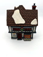 Department 56 Tutbury Printer, Dickens' Village, 1990 – front view from above showing snow patches on the shingle roof