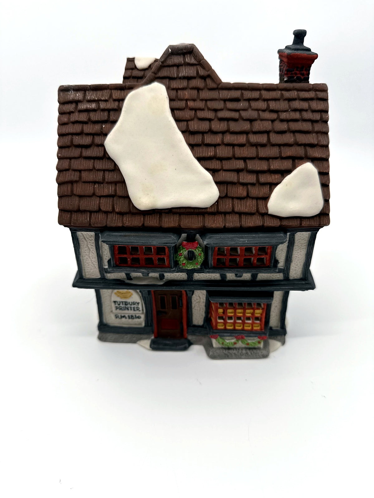 Department 56 Tutbury Printer, Dickens' Village, 1990 – front view from above showing snow patches on the shingle roof