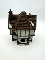 Department 56 Tutbury Printer, Dickens' Village, 1990 – back view showing the light cord opening and stone chimney
