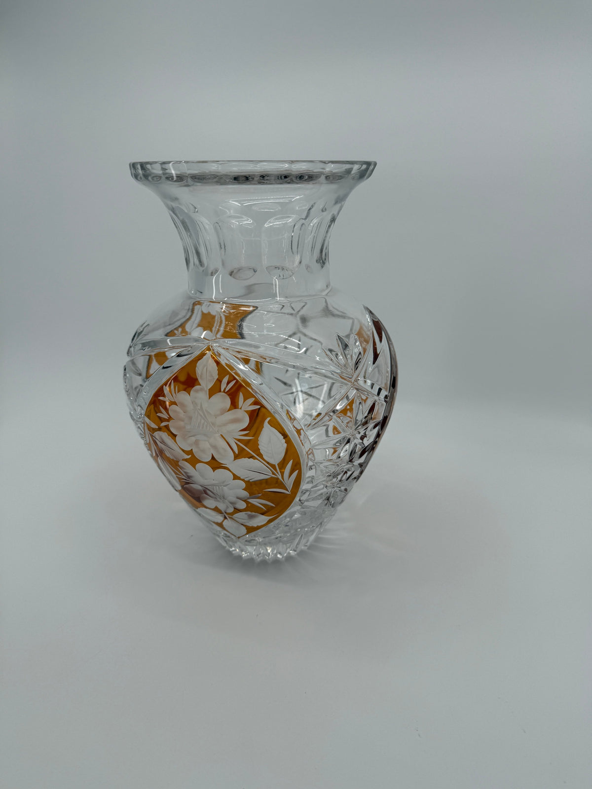 Amber cut-to-clear crystal floral vase, front view (original color)
