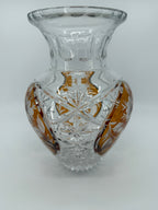 Amber crystal vase, three-quarter close view showing starburst cutting (original color)