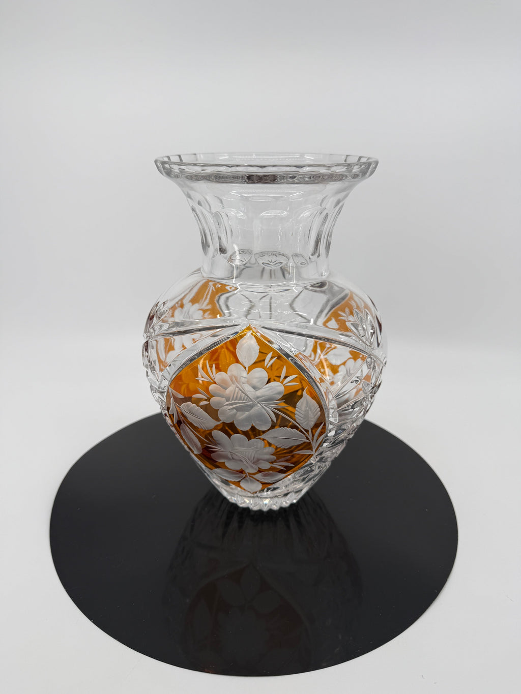 Amber crystal vase on display stand, starburst panel front (original color)