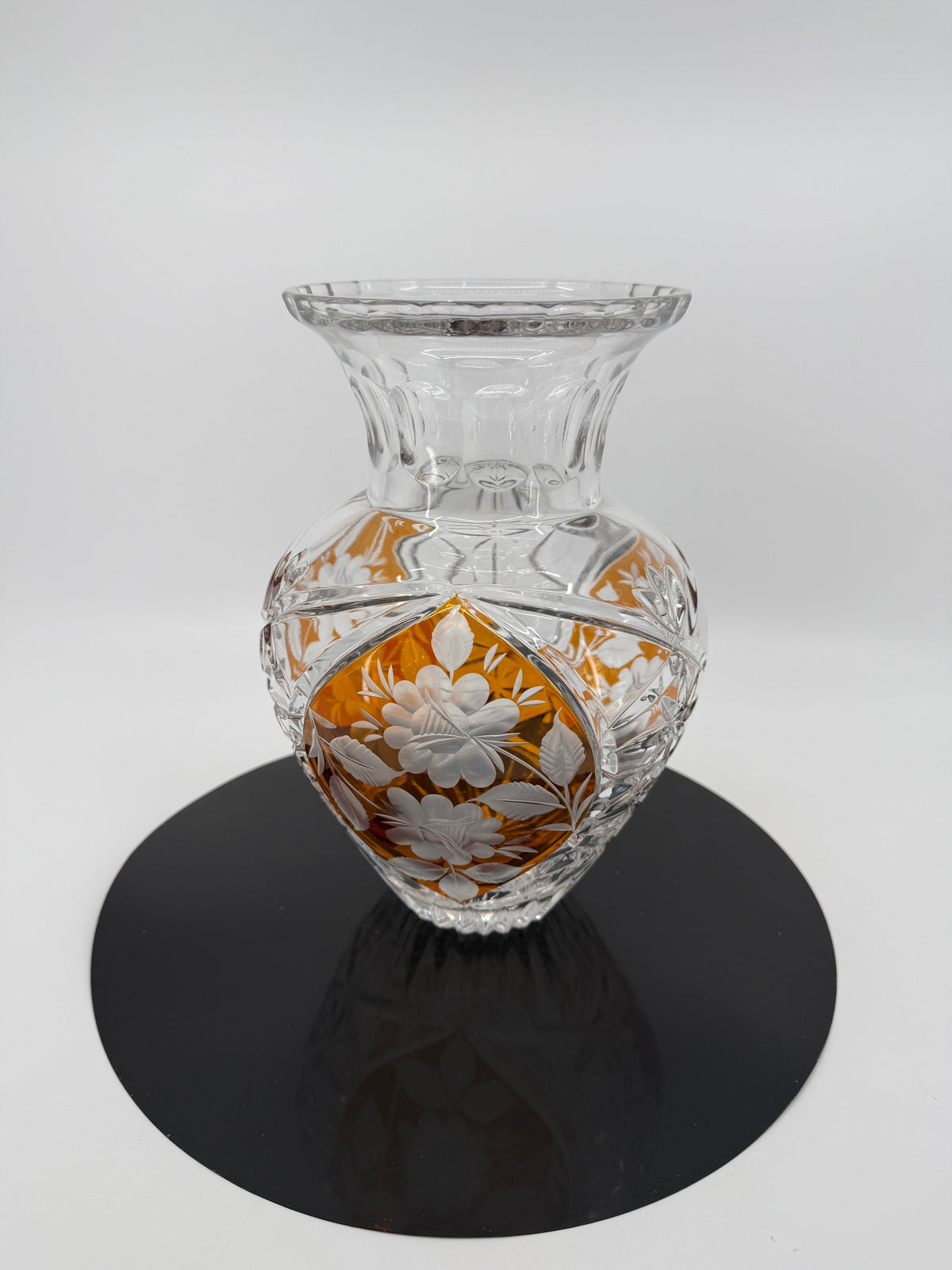 Amber crystal vase on display stand, starburst panel front (original color)