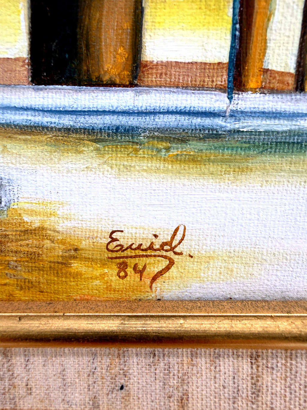 1984 signed oil on canvas Venezuelan street scene, framed — close-up of the signature, second view