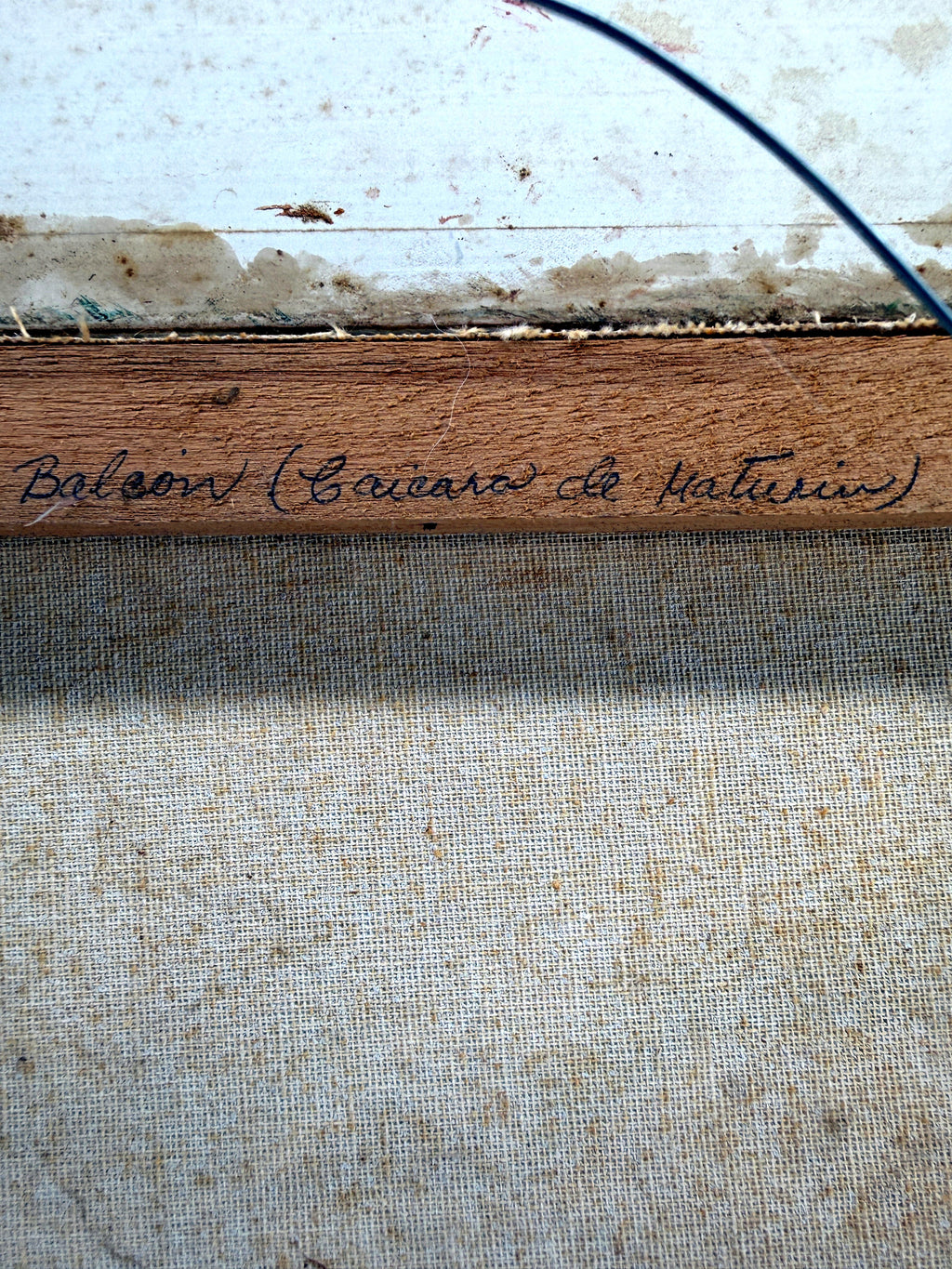 1984 signed oil on canvas Venezuelan street scene, framed — close-up of the handwritten inscription on the stretcher bar