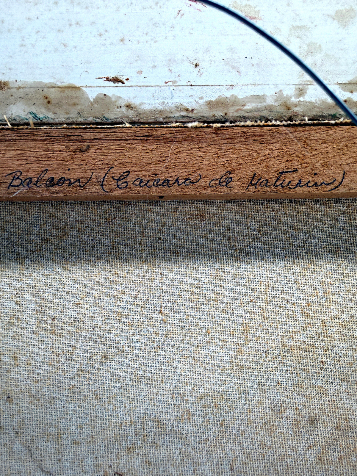 1984 signed oil on canvas Venezuelan street scene, framed — close-up of the handwritten inscription on the stretcher bar