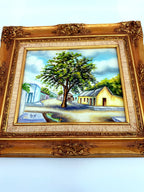 1984 signed oil on canvas Venezuelan street scene, framed — front view, closer crop of the ornate gilt frame