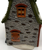 Detail: gable-end stonework (detail from seller photo)