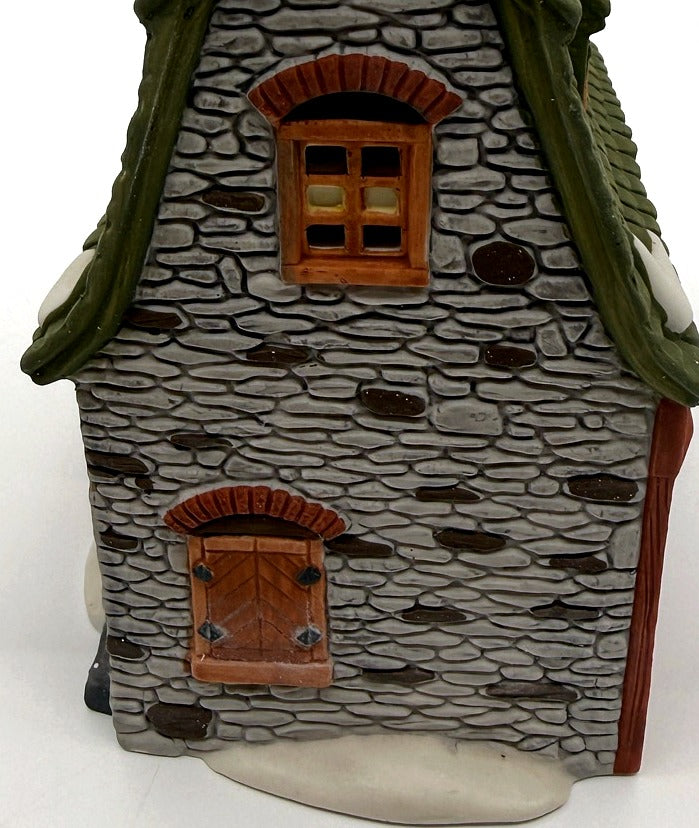 Detail: gable-end stonework (detail from seller photo)