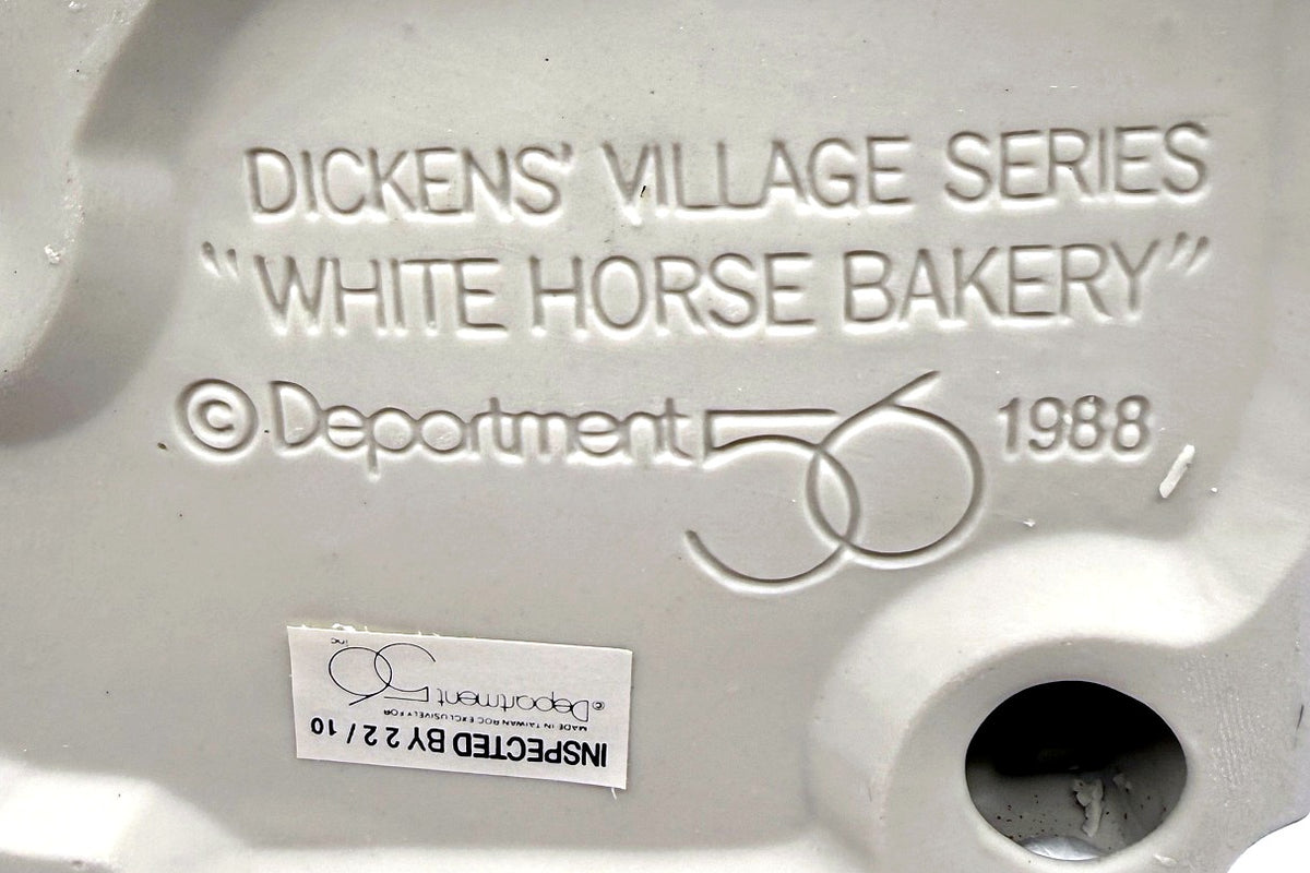 Detail: underside molded stamp and Made in Taiwan sticker (detail from seller photo)