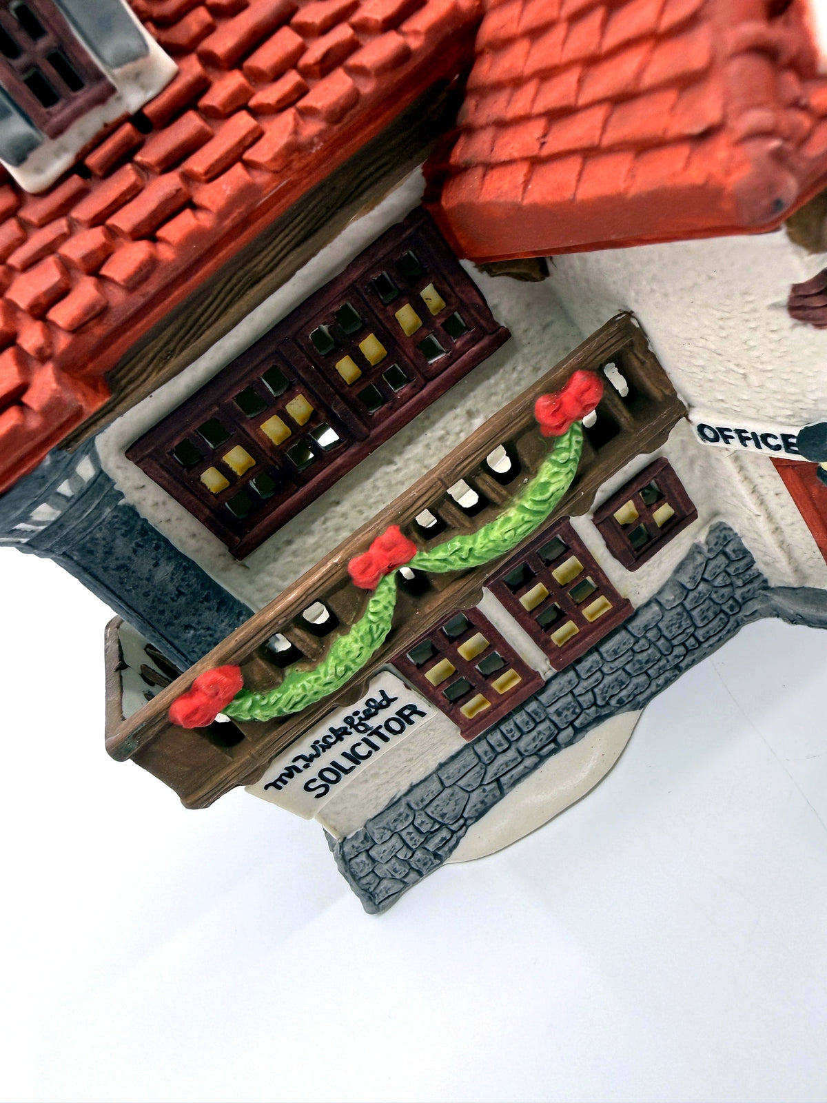 Department 56 Mr. Wickfield Solicitor, Dickens' Village, David Copperfield, 1989 – close-up detail: windows, garland balcony and Solicitor sign