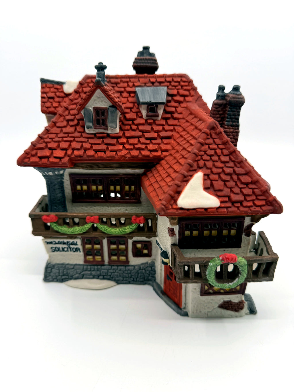 Department 56 Mr. Wickfield Solicitor, Dickens' Village, David Copperfield, 1989 – front view: Mr. Wickfield Solicitor sign, garland balcony, Office door