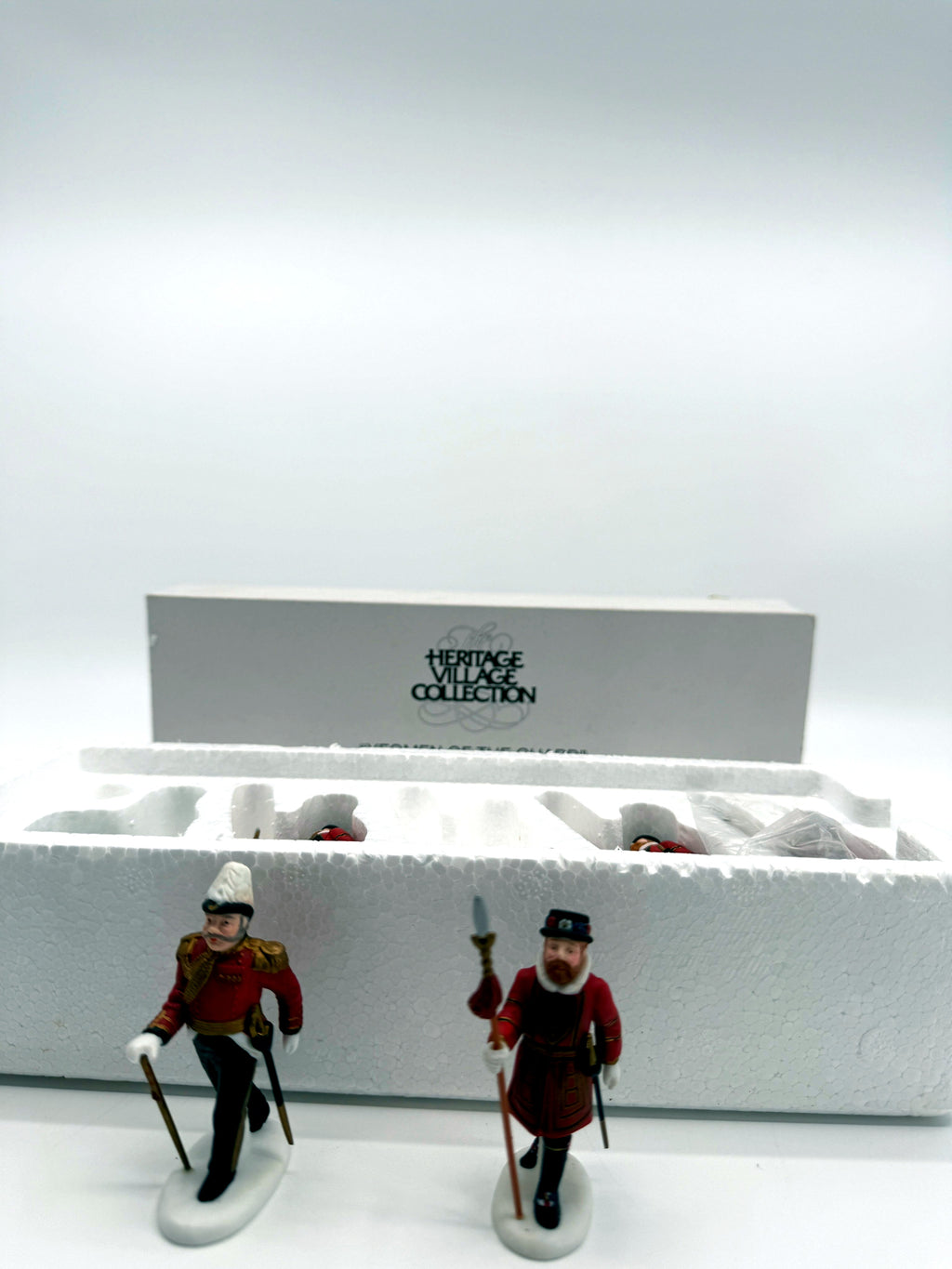Department 56 Dickens' Village Yeomen of the Guard, set of 5 - the officer and one Beefeater guard standing, wide view with the original box behind