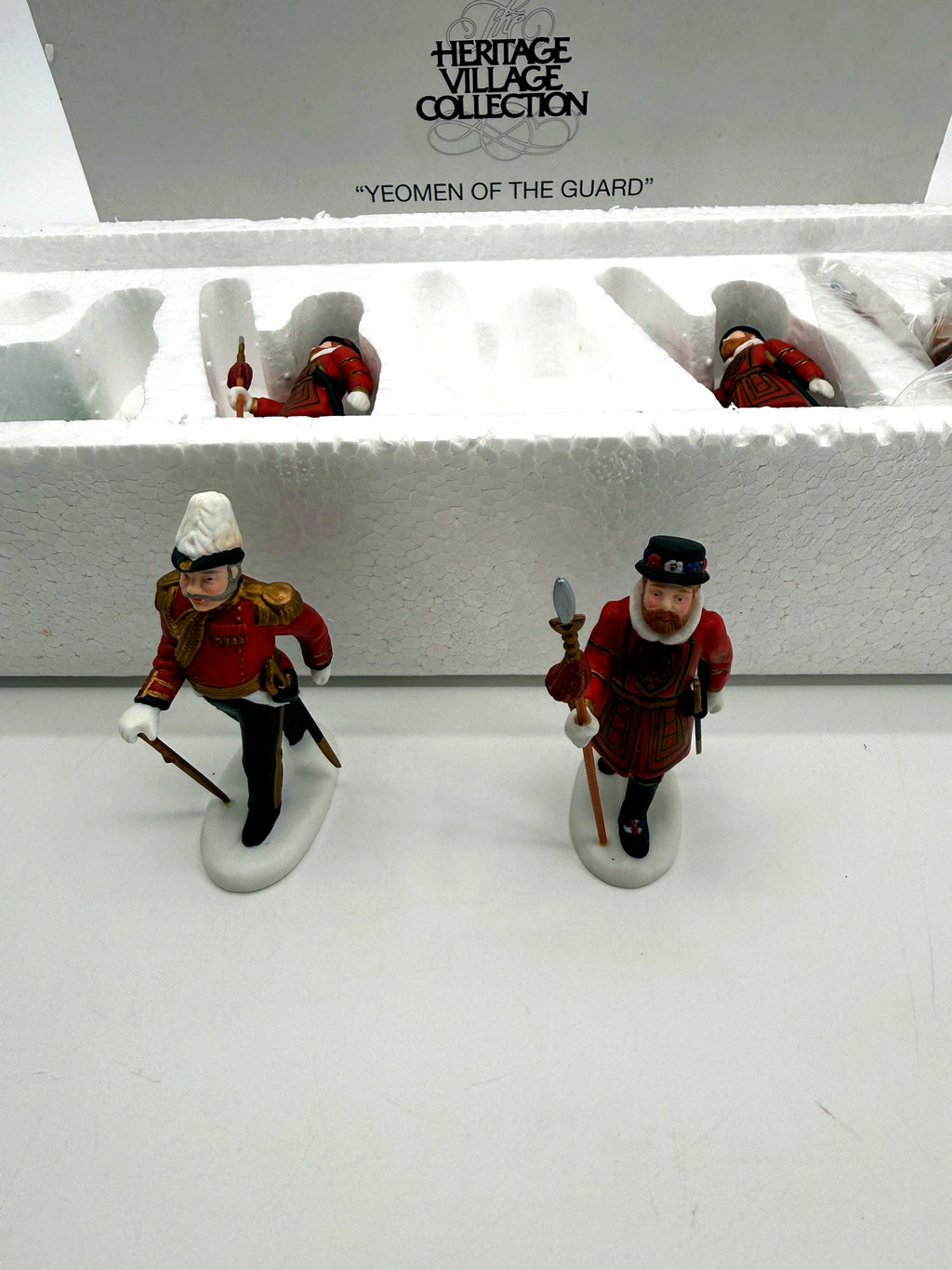 Department 56 Dickens' Village Yeomen of the Guard, set of 5 - close view of the officer and a Beefeater guard showing the hand-painted uniform detail