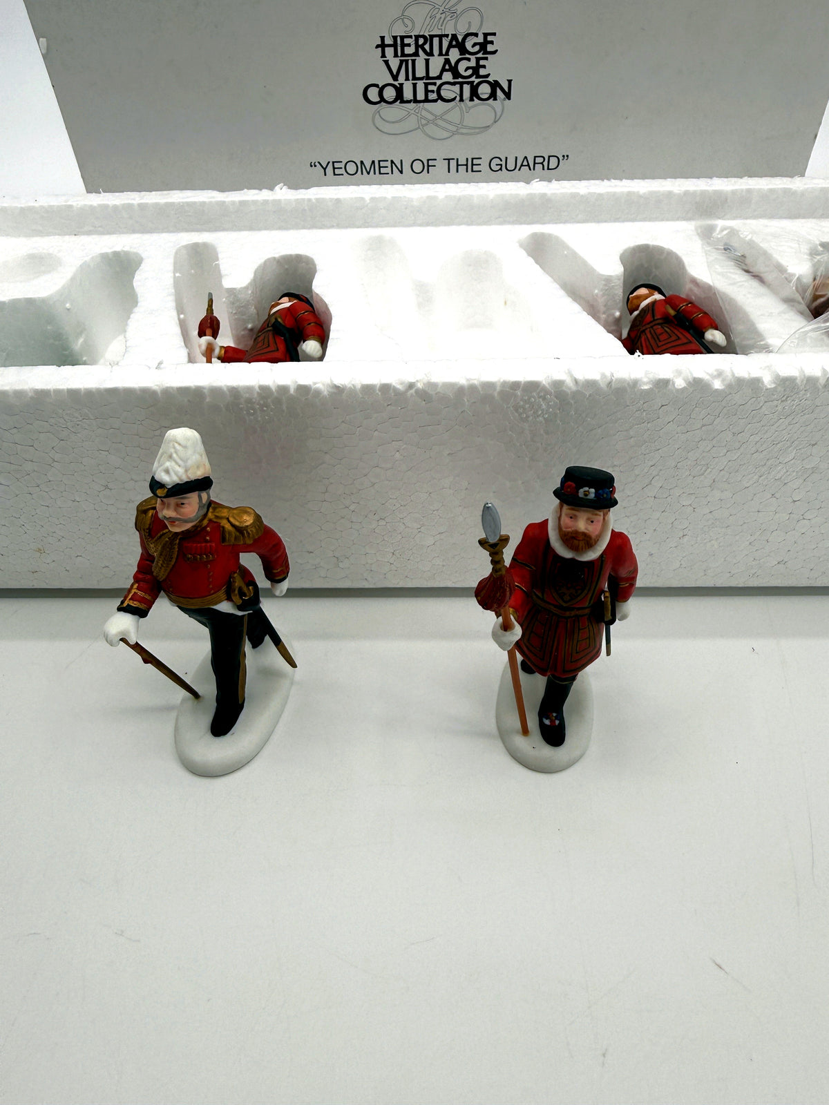 Department 56 Dickens' Village Yeomen of the Guard, set of 5 - close view of the officer and a Beefeater guard showing the hand-painted uniform detail